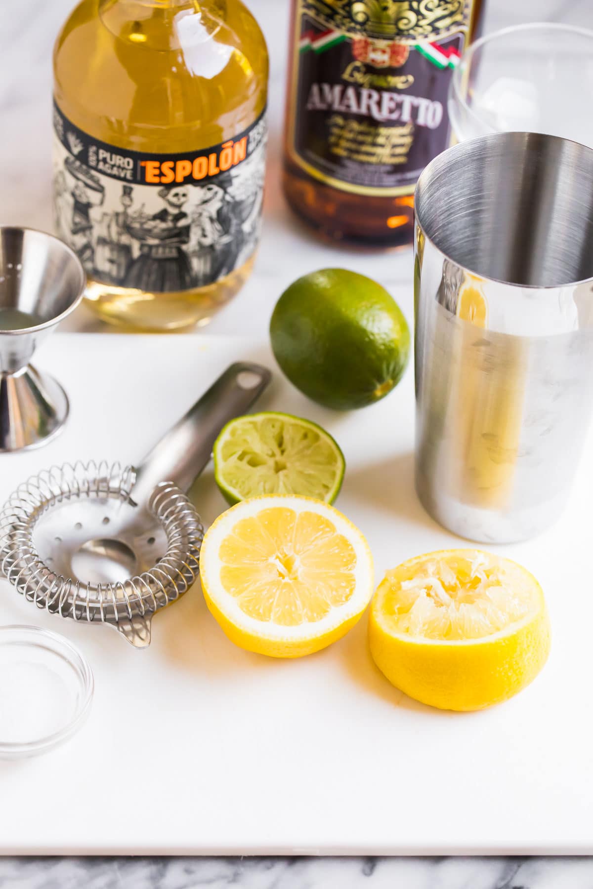 Ingredients and tools for mixing an Italian Margarita