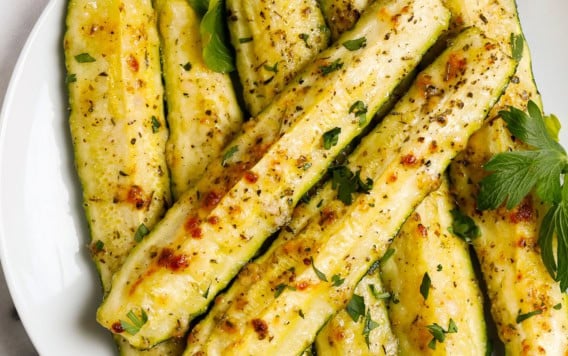 a plate with the best roasted zucchini spears