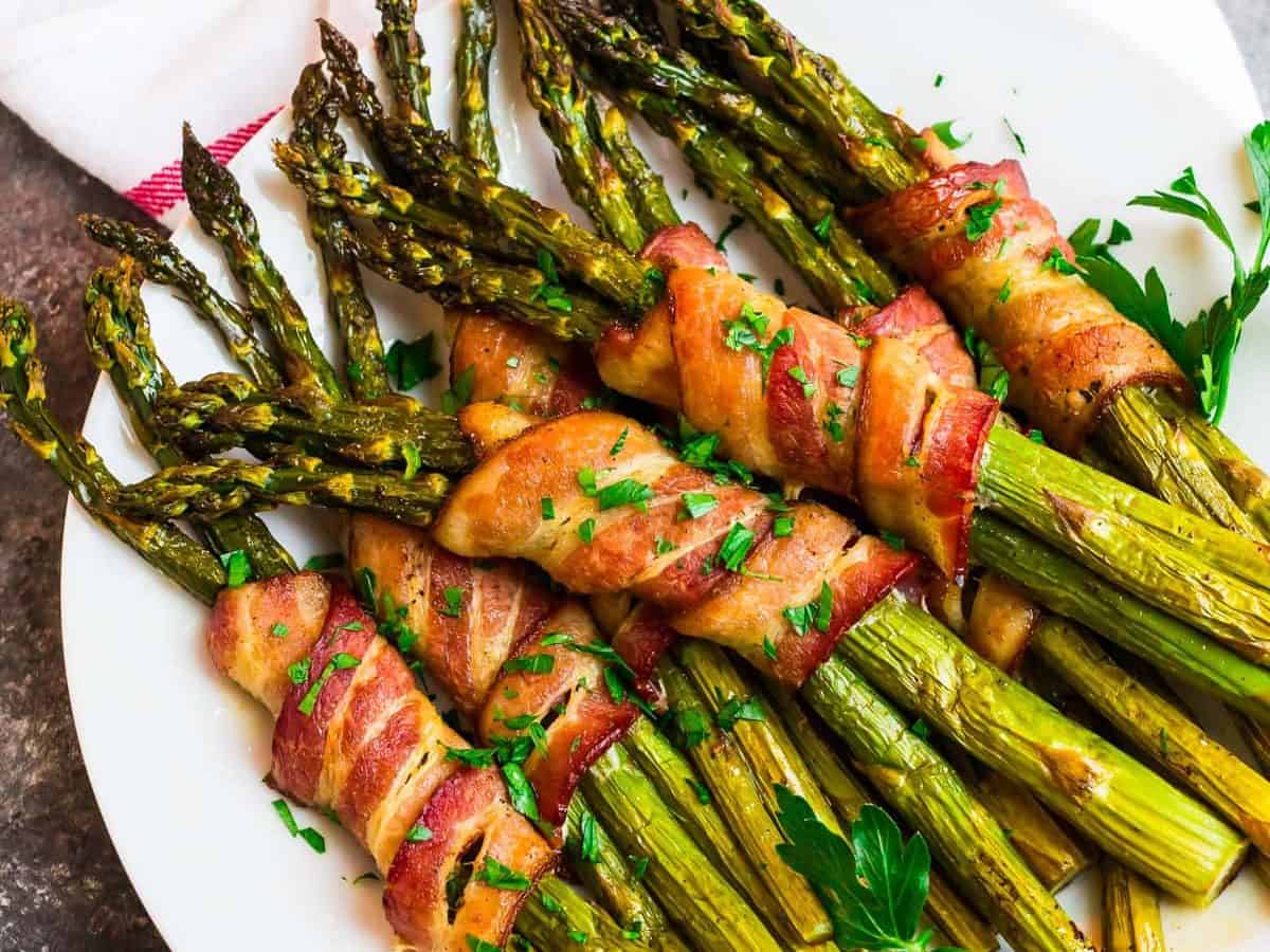 bacon wrapped asparagus on a plate