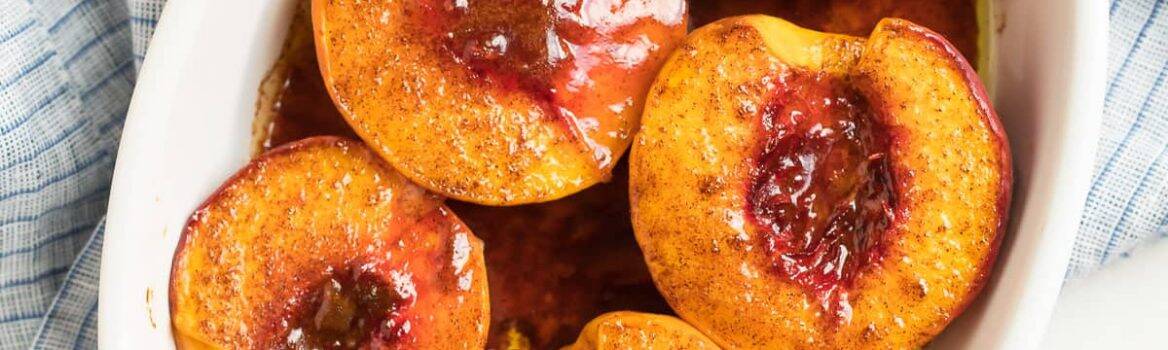 baked peaches in a dish