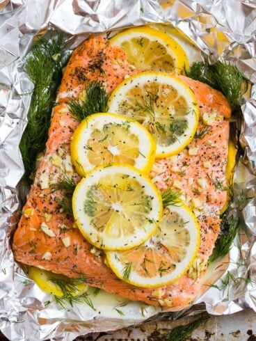 Grilled Salmon in Foil topped with lemon, dill, garlic, and butter