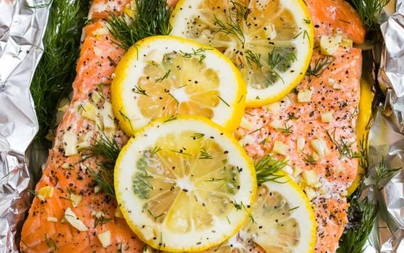 Grilled Salmon in Foil topped with lemon, dill, garlic, and butter