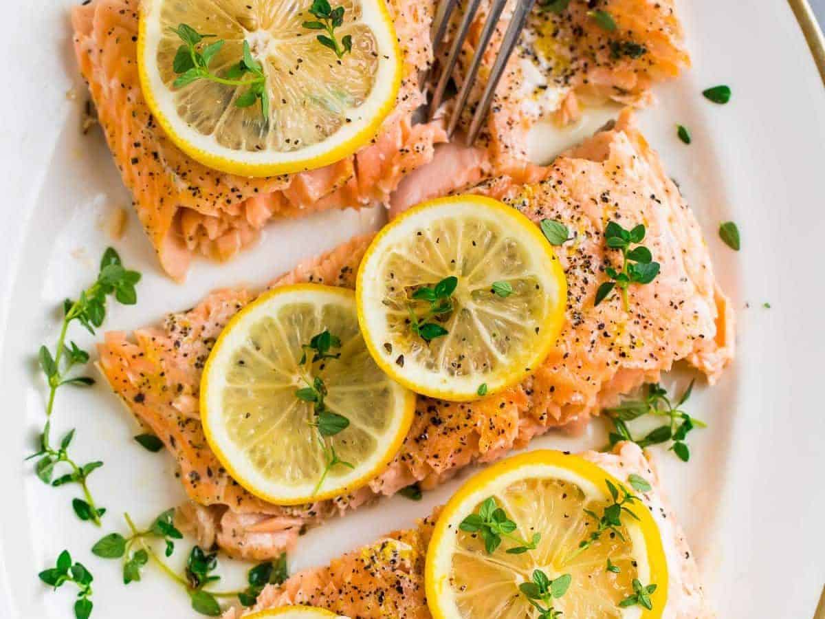Perfectly cooked Lemon Pepper Salmon baked in the oven