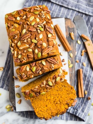 A loaf of moist vegan pumpkin bread made without oil