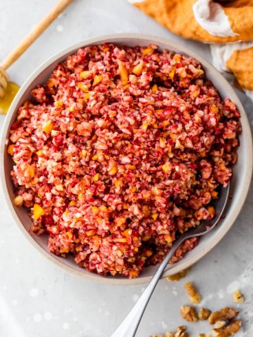 A white bowl with cranberry orange relish for Thanksgiving