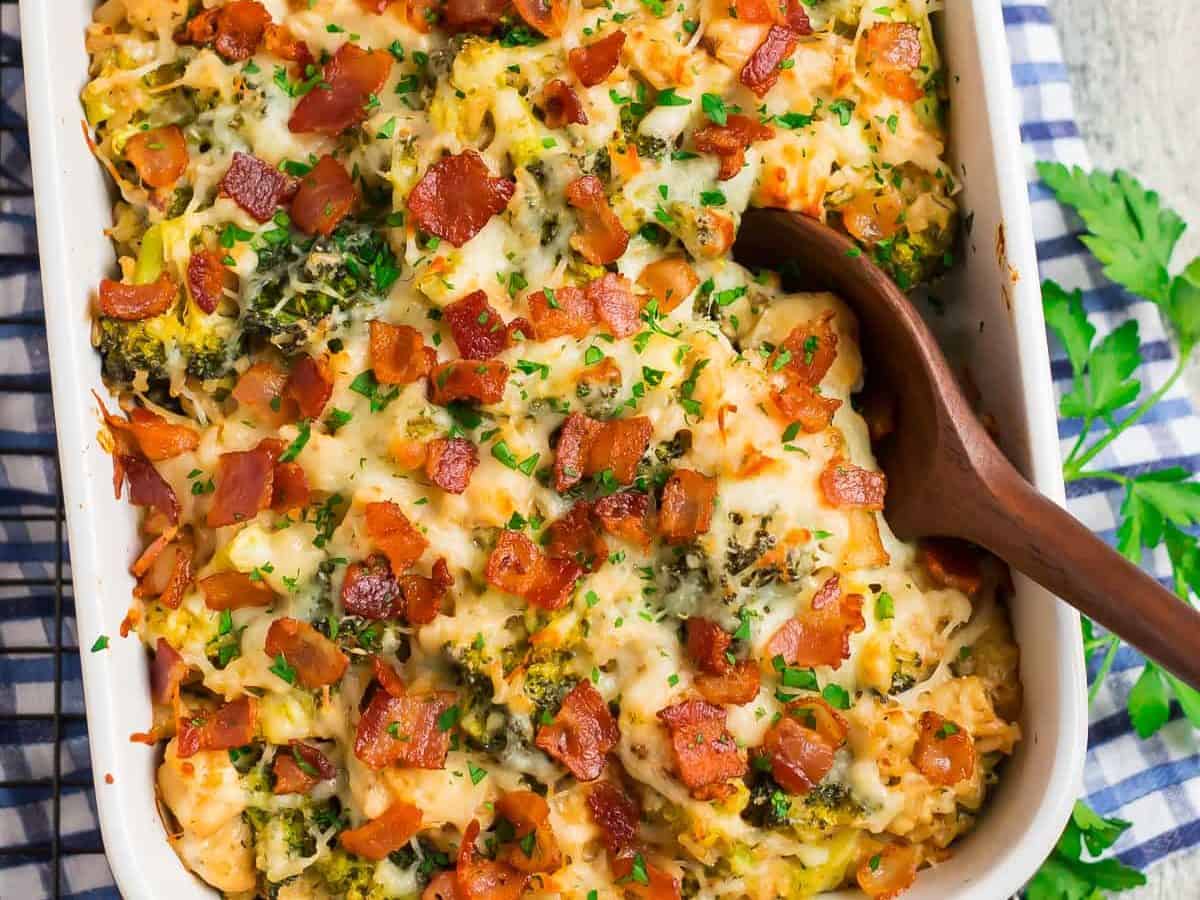 A dish with cheesy Chicken Bacon Ranch Casserole with rice and broccoli, made healthy ingredients