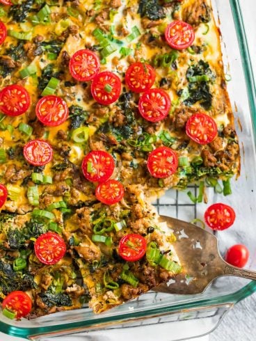 Easy Homemade Whole30 Breakfast Casserole with sausage, spinach, eggs, and tomatoes in a serving dish