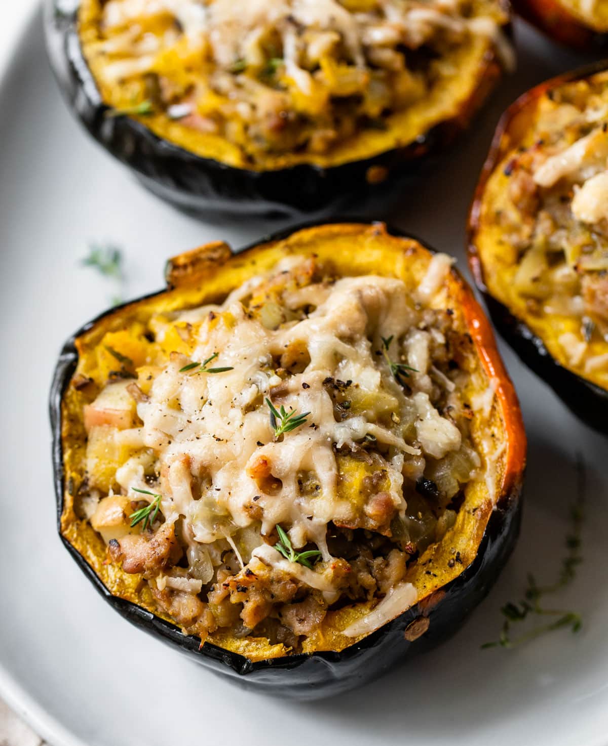 https://www.wellplated.com/wp-content/uploads/2019/12/best-stuffed-acorn-squash-recipe.jpg?utm_source=chatgpt.com