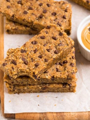 a stack of Vegan Protein Bars made with oats, dates, and peanut butter with chocolate chips