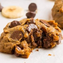 Soft peanut butter banana cookies with chocolate chips on a cookie sheet