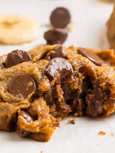 Soft peanut butter banana cookies with chocolate chips on a cookie sheet