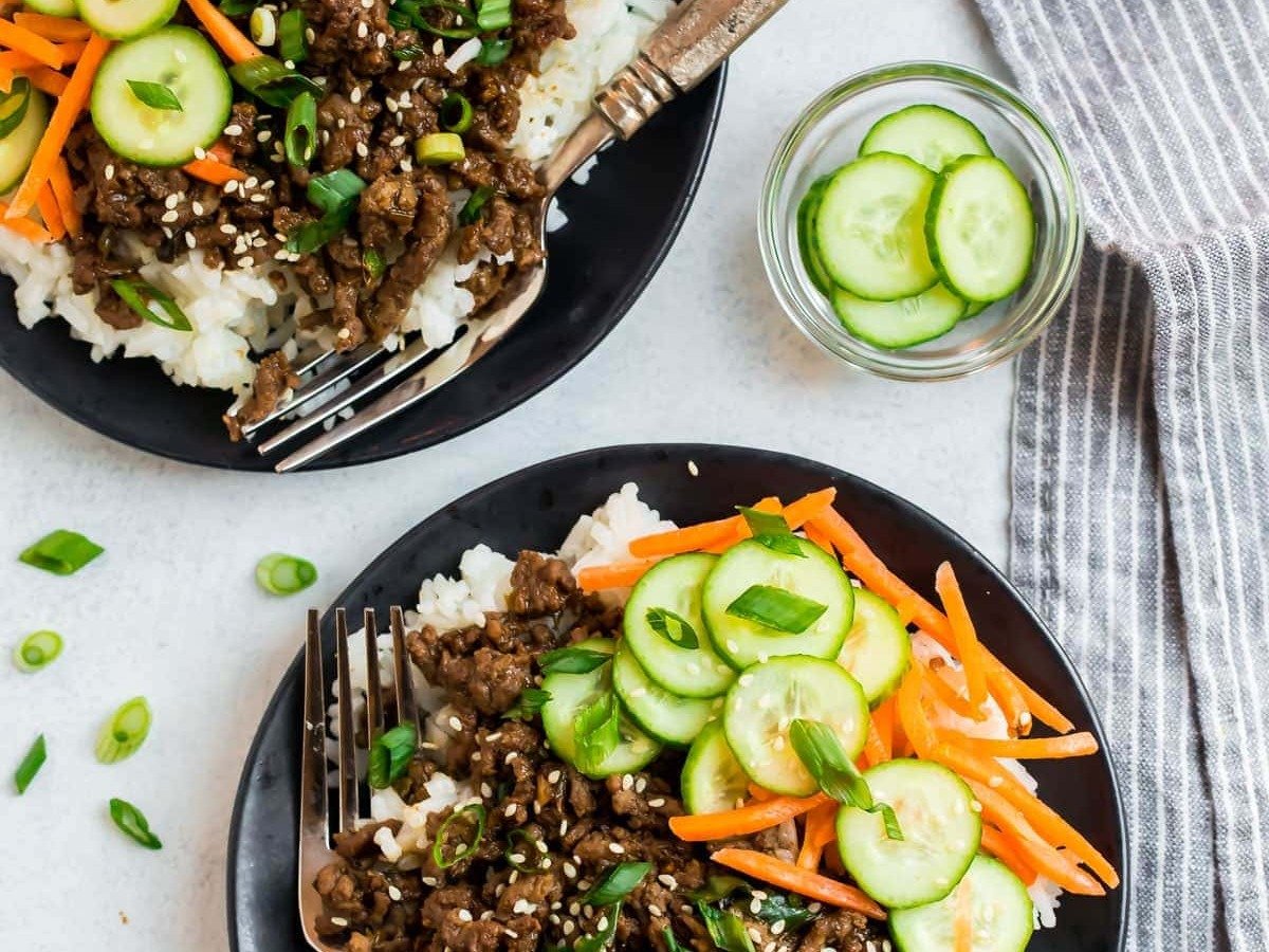 Healthy Korean beef bowl with vegetables on rice