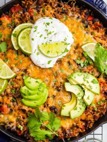 Cheesy beef taco skillet in a cast iron pan