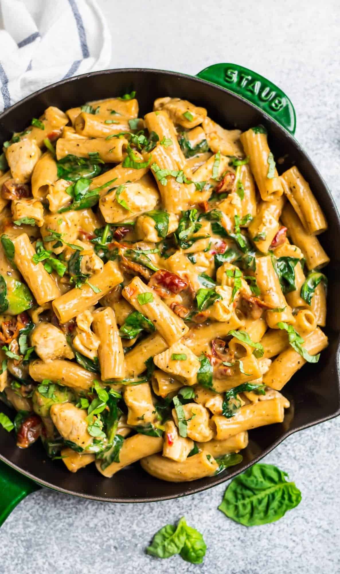 Mac and cheese with chicken breast in a skillet