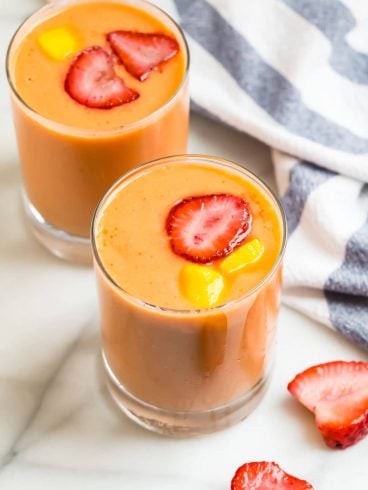 Two strawberry mango smoothies in glasses