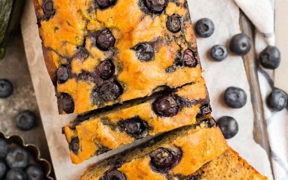 Easy blueberry zucchini bread cut into slices