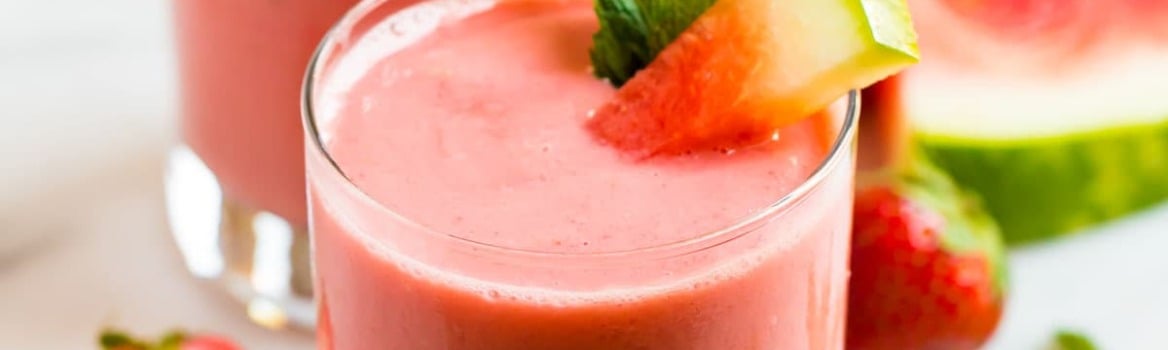 Two watermelon smoothies with strawberry