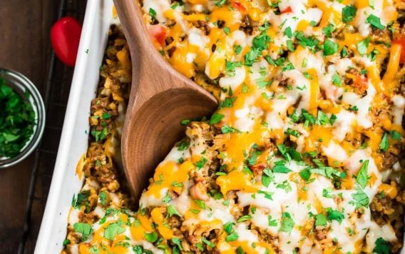 Cheesy Mexican casserole in a baking dish