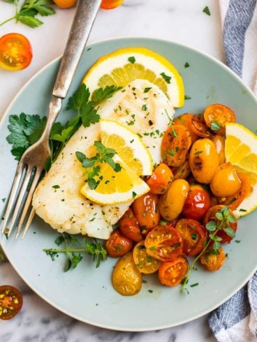 Easy pan fried cod with tomatoes and lemon