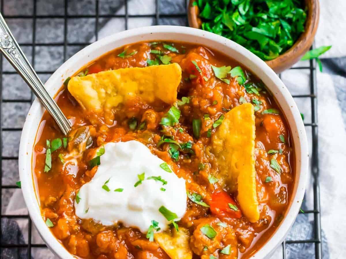 Pumpkin chili in a bowl with chips