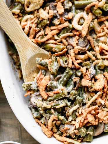A baking dish of crockpot green bean casserole