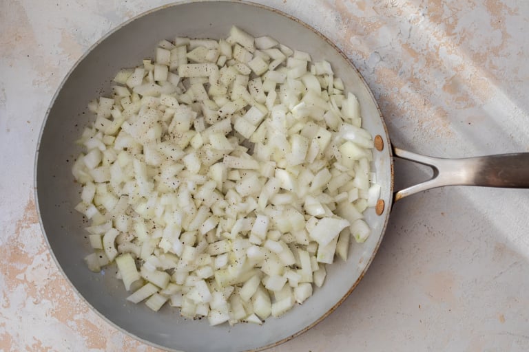 Onions in skillet for crock pot stuffing