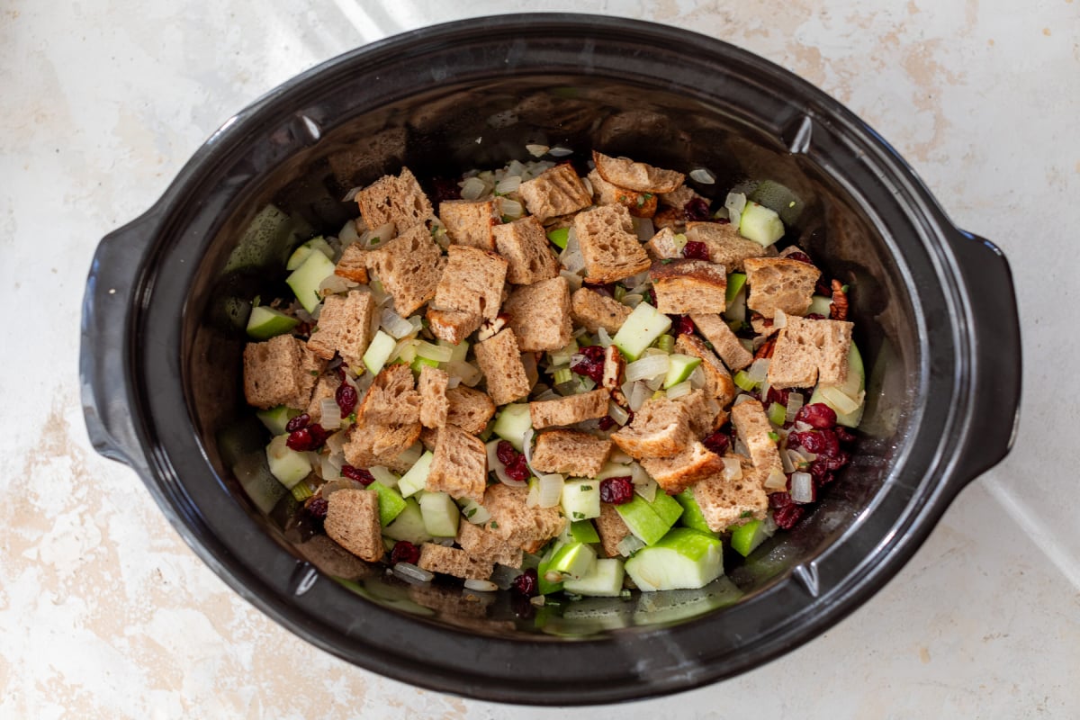 Bread and veggies in slow cooker for stuffing