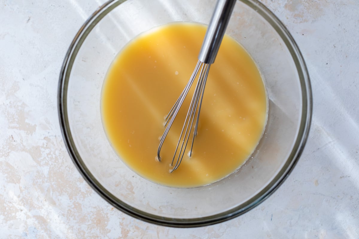 Egg mixture for stuffing in bowl with whisk
