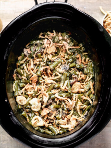 A slow cooker with vegetables