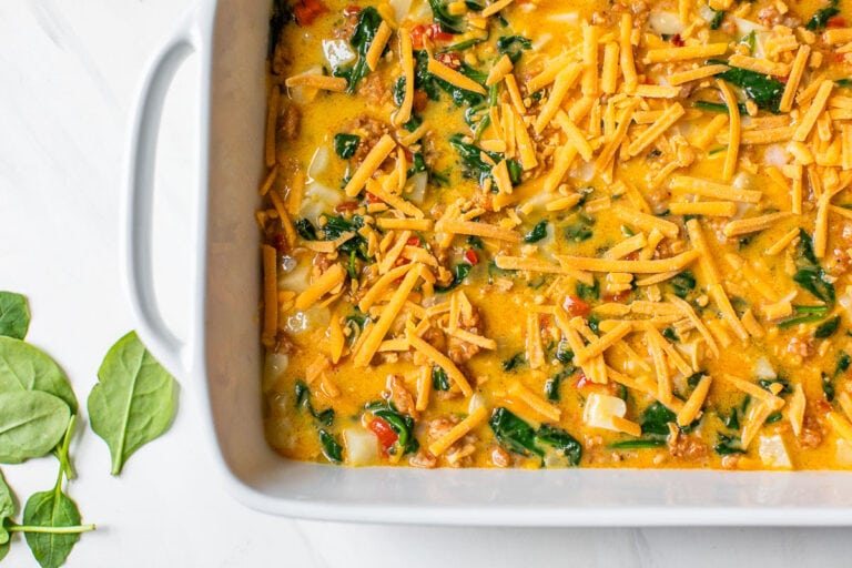 Cheese scattered on top of a casserole