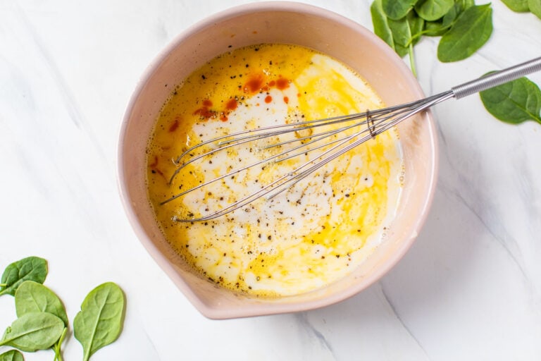 Eggs being whisked in a bowl