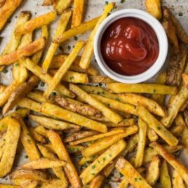 How to make Crispy Baked Oven Fries! Easy method that makes the most perfect, healthy French fries every time. Try this recipe with Garlic and Ranch or add any of your own favorite seasonings.