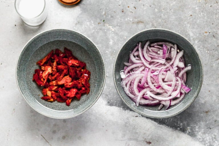 A bowl of sun-dried tomatoes and onions
