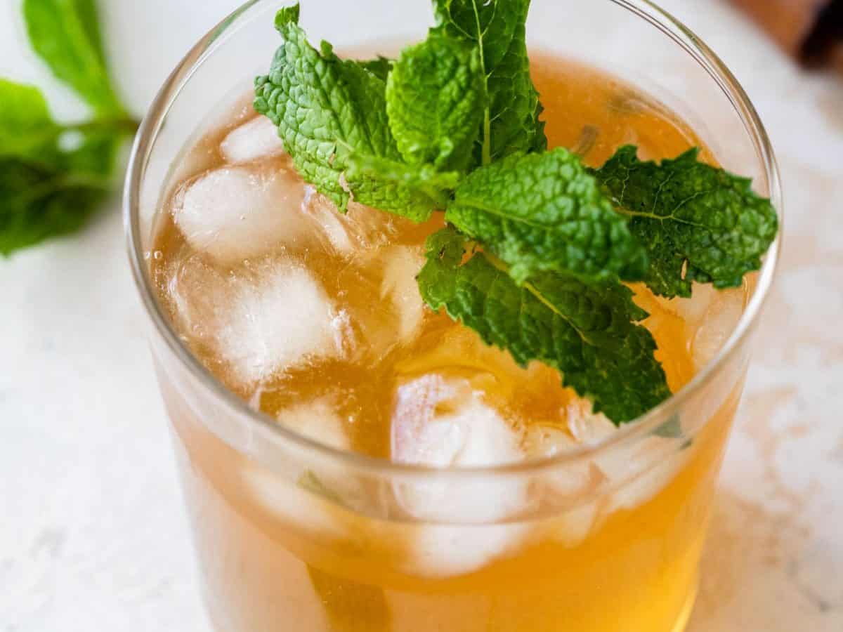 Whiskey smash cocktail in highball glass