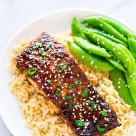 soy ginger salmon on bed of rice.