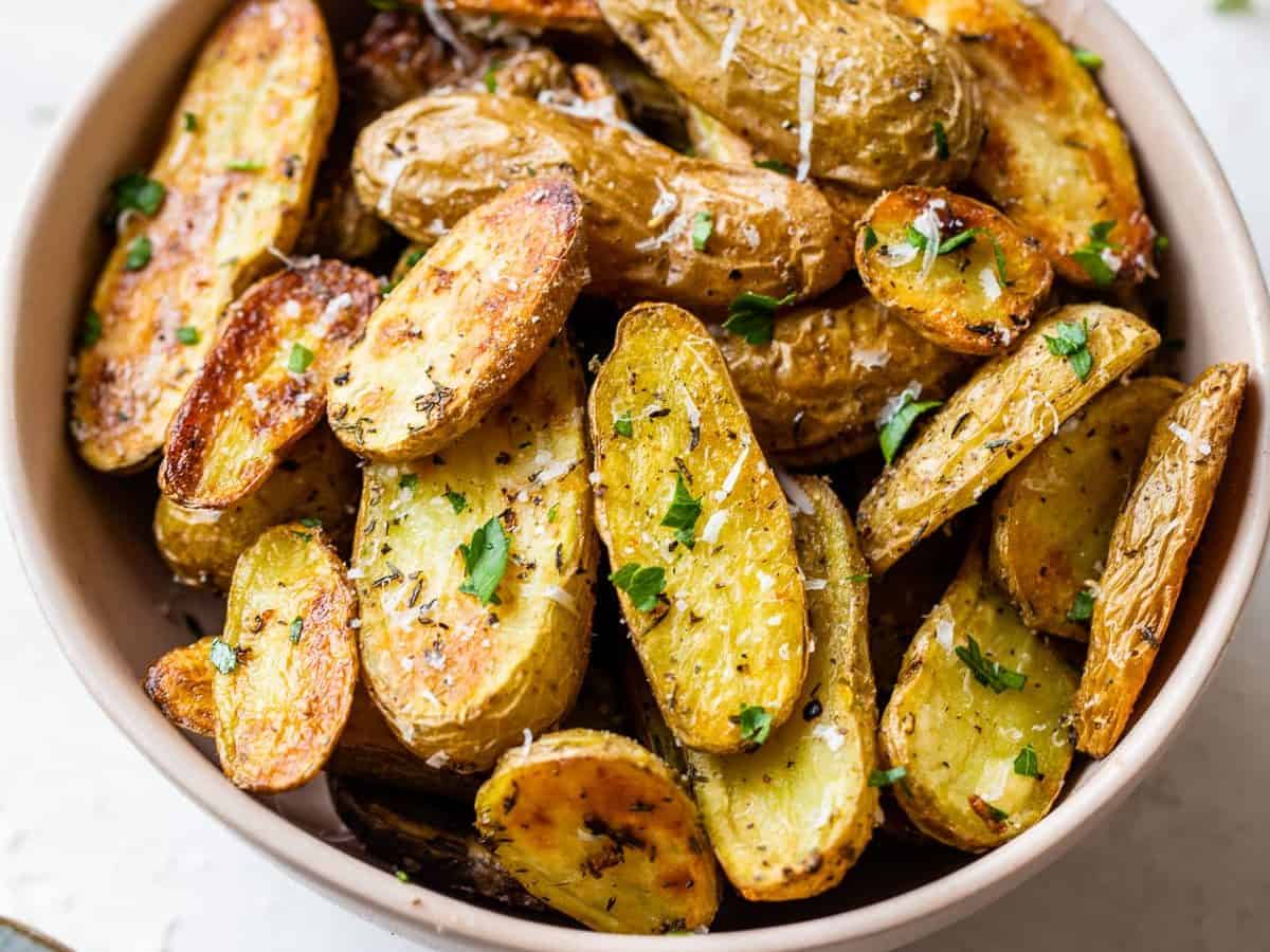 A bowl of roasted fingerling potatoes