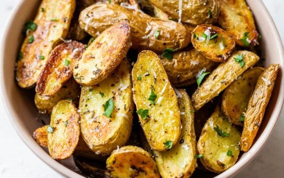 A bowl of roasted fingerling potatoes