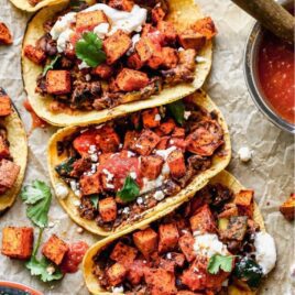Vegetarian Tacos on parchment paper.