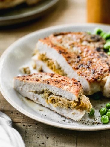 stuffed pork chops with cheese on a plate