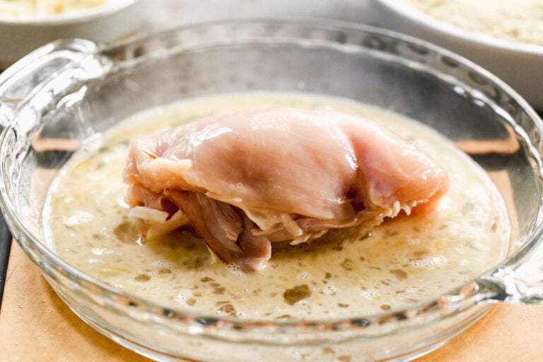 Chicken stuffed with ham and cheese in an egg wash