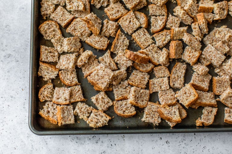 toasted bread cubes on a sheet pan for stuffing