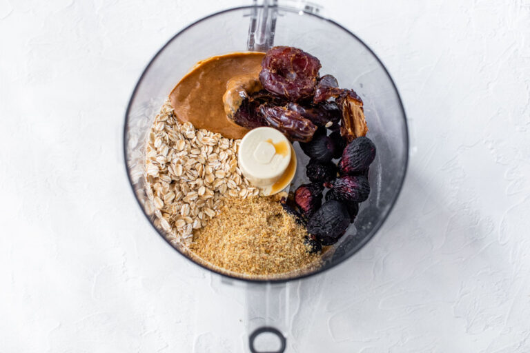 figs, dates, oats, and almond butter in a large food processor