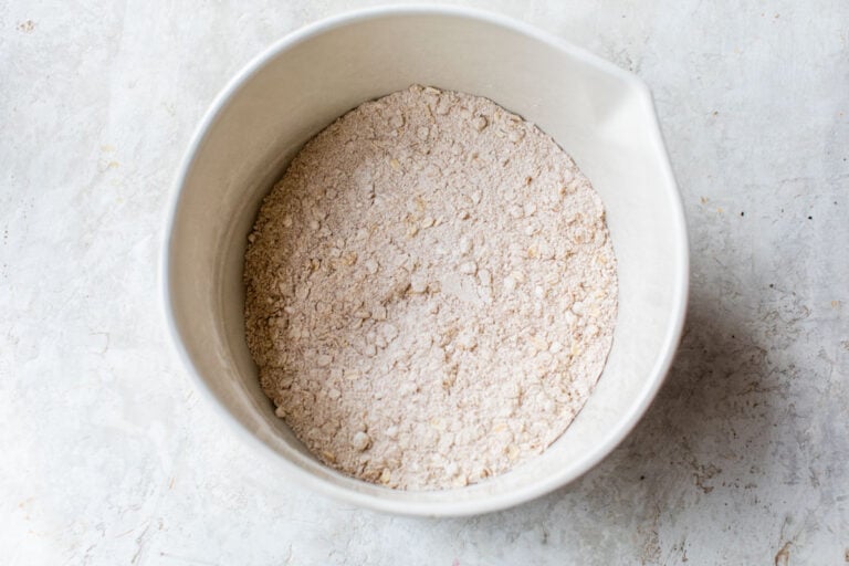 dry ingredients in a mixing bowl for healthy oat muffins