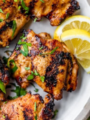 The best grilled chicken thighs on a plate