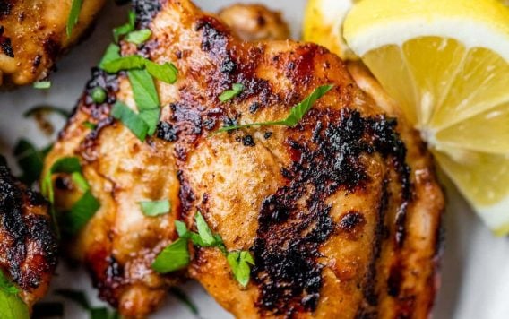 The best grilled chicken thighs on a plate