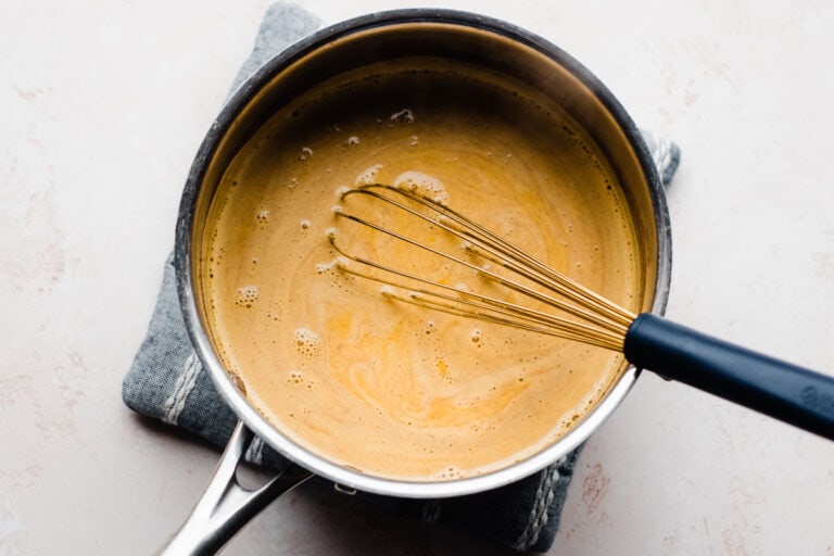 a sauce pan with cold fighting golden turmeric milk for sleep