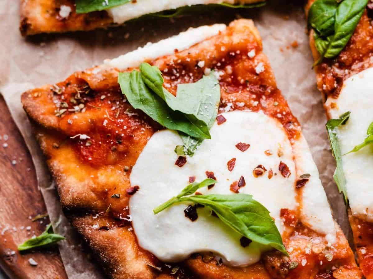 Naan pizza with cheese and basil