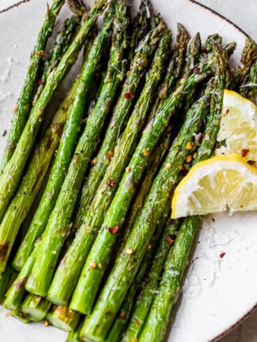 The best air fryer asparagus on a white plate