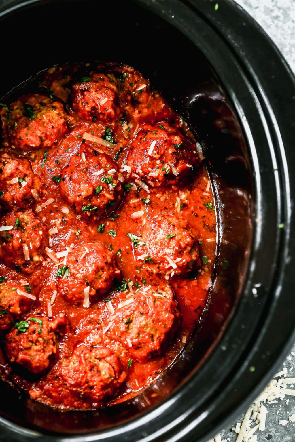 Classic Italian Style Crockpot Meatballs simmering in a rich red sauce