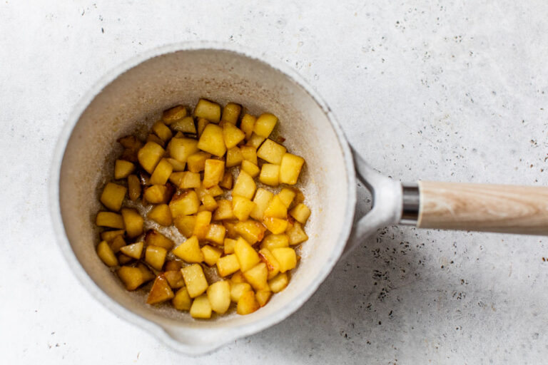 Cooked apple chunks in a pot